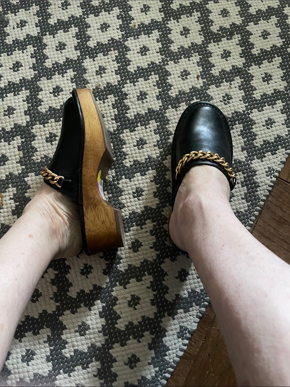 Tory Burch Black Leather Mules with Gold Chain Trim